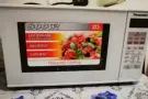【低价出售9.9成新Panasonic微波炉】